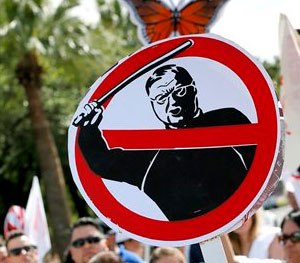 Protestors of U.S. Immigration and Customs Enforcement (ICE) agents working with Maricopa County Sheriff Joe Arpaio, gather, Thursday, April 23.