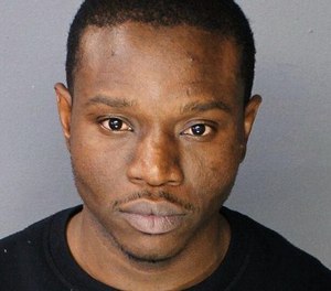 Ainsley Johnson, 34, was charged with resisting arrest and assaulting a police officer.