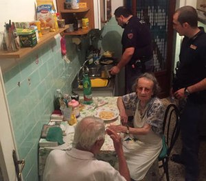 Police say that four officers who came to the couple's apartment used butter, cheese, spaghetti and