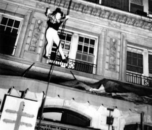 In this Dec. 7, 1946 photo, a woman leaps from an upper story to escape the burning Winecoff Hotel in Atlanta.