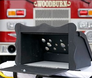 A prototype of a baby box, where parents could surrender their newborns anonymously, is shown outside the fire station in Woodburn, Ind.