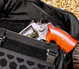The AMP 24 has a “CCW pocket” large enough to easily secret this 4” barreled .44 magnum.