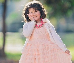 Jaina McGloghlon was found not breathing with a large balloon around her head after returning home from a birthday party.