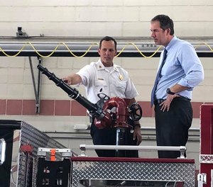 Attendees check out the new equipment during an unveiling ceremony at the Woodlawn Station #3.