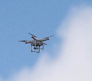 Police officers survey the scene via a drone at a Wells Fargo Bank, Friday, July 7, 2017 in Marietta, Ga.