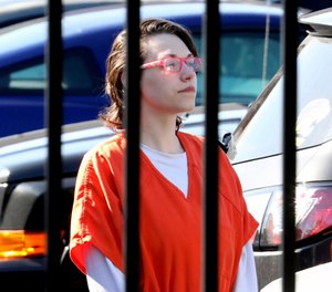 Elizabeth Lecron leaves U.S. District Court Thursday, Aug. 29, 2019 in Toledo, Ohio.