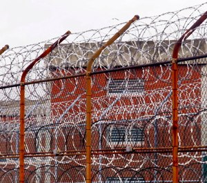 Rikers Island, where four corrections officers have been accused of watching before intervening in an inmate's attempt to hang himself. (Photo/AP)