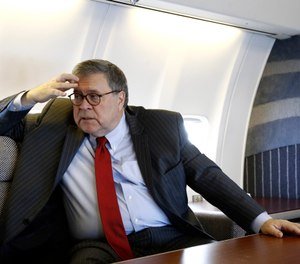 Attorney General William Barr speaks with an Associated Press reporter onboard an aircraft en route to Cleveland, Ohio. (Photo/AP)