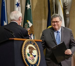 U.S. Attorney General William Barr is introduced by Deputy U.S. Attorney General Jeffery Rosen before delivering remarks to announce the establishment of the President’s Commission on Law Enforcement and the Administration of Justice.