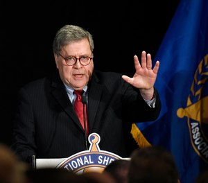 Attorney General William Barr speaks at the National Sheriffs' Association Winter Legislative and Technology Conference in Washington, Monday, Feb. 10.