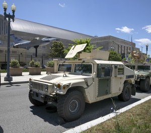 Vehicles for the District of Columbia National Guard are seen outside the D.C. Armory, Monday, June 1, 2020, in Washington.