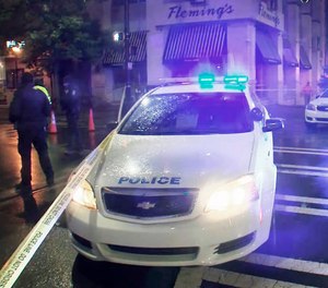 Authorities say at least one officer was involved in the shooting early Friday that left one person dead and another hospitalized with non-life-threatening wounds. (Photo/AP)