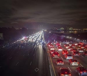 Protesters rallying against police violence block both directions of Interstate 80 in Berkeley, Calif., on Monday, Dec. 8, 2014. (AP Image)