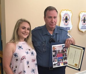 37-year veteran Senior Cpl. Thomas Murphy, who is set to retire soon, met Jessica Fogal after New Castle County contacted her family to set up a meeting.