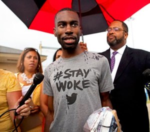 In this July 10, 2016, file photo, Black Lives Matter activist DeRay Mckesson talks to the media after his release from the Baton Rouge jail in Baton Rouge, La.