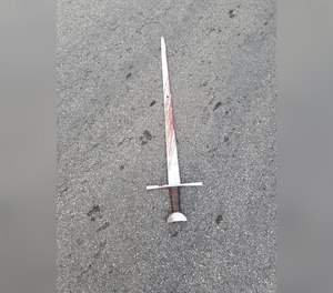 A Thursday, July 30, 2020 photo shows blood on the sword police say the suspect swung at officers.
