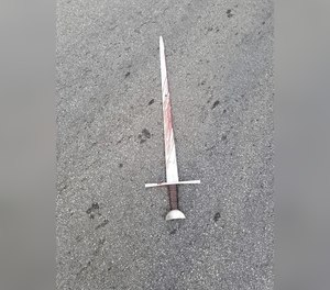 A Thursday, July 30, 2020 photo shows blood on the sword police say the suspect swung at officers.