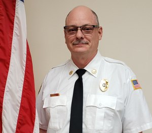 Lincoln Fire Chief Bob Dunovsky apologized in a written statement Thursday for sharing a Facebook post that mentioned the shooting of looters.