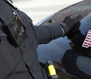 In this Feb. 2, 2015 file photo, Officer Dan Merseth has his body camera activated alongside a squad car in Duluth, Minn.