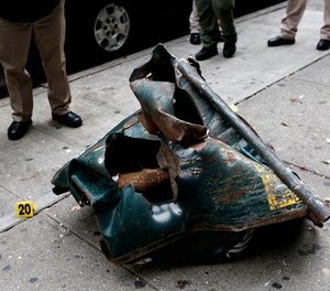 A view of a mangled construction toolbox, Sunday, Sept. 18, 2016, at the site of an explosion that occurred on Saturday night in the Chelsea neighborhood of New York. (Justin Lane/EPA via AP, Pool)