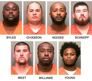 This combo of booking photos released by the Clarksville, Tenn., Police Department shows, top row from left, William L. Byles, Kenneth Chiasson, Antwon D. Keesee and Jonathan Schnepp; bottom row from left, Roger D. West, Prentice L. Williams and Joshua Young. (Clarksville Police Department via AP)