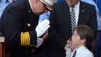 Boy, 7, named honorary firefighter after saving mother