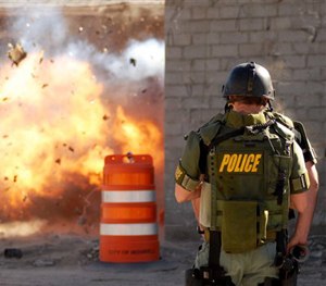 Members of the Roswell Police Department SWAT team perform explosive breaching training Thursday, Feb. 7, 2008.