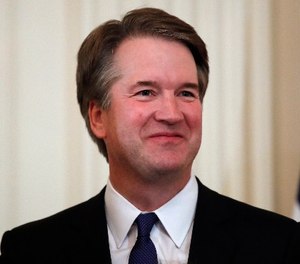 Judge Brett Kavanaugh, President Donald Trump's Supreme Court nominee stands in the East Room of the White House, Monday, July 9, 2018, in Washington.