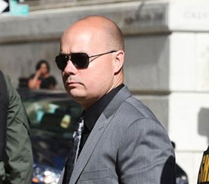 Baltimore Police Lt. Brian Rice arrives at Courthouse East on Tuesday, July 5, 2016, in Baltimore for a pretrial hearing related to the arrest and death of Freddie Gray.