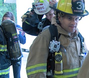 First responders test the Burn Saver device during an operational field exercise.