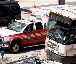 The windshield of a New Jersey Transit bus is cracked after an accident inside the Lincoln Tunnel, Wednesday, June 10, 2015 in New York. The bus rear-ended a private bus carrying Canadian schoolchildren inside the Lincoln Tunnel on Wednesday morning, injuring at least 18 people and slowing traffic on one of the busiest routes for commuters entering and leaving New York City, authorities said. None of the 26 students and two adults from the Toronto school was hurt, according to Anna Caputo, spokeswoman for the Toronto District School Board. (AP Photo/Mark Lennihan)