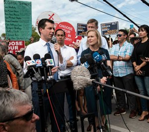 Democratic presidential candidate, Mayor Pete Buttigieg, makes a statement to media outside of the Homestead Detention Center on June 28, 2019. (Jennifer King/Miami Herald via AP)