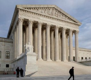 In this Feb. 14, 2017 photo, The Supreme Court is seen at day's end in Washington.
