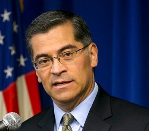 In this Jan. 24, 2018 file photo California Attorney General Xavier Becerra talks during a news conference in Sacramento, Calif. (AP Photo/Rich Pedroncelli,File)