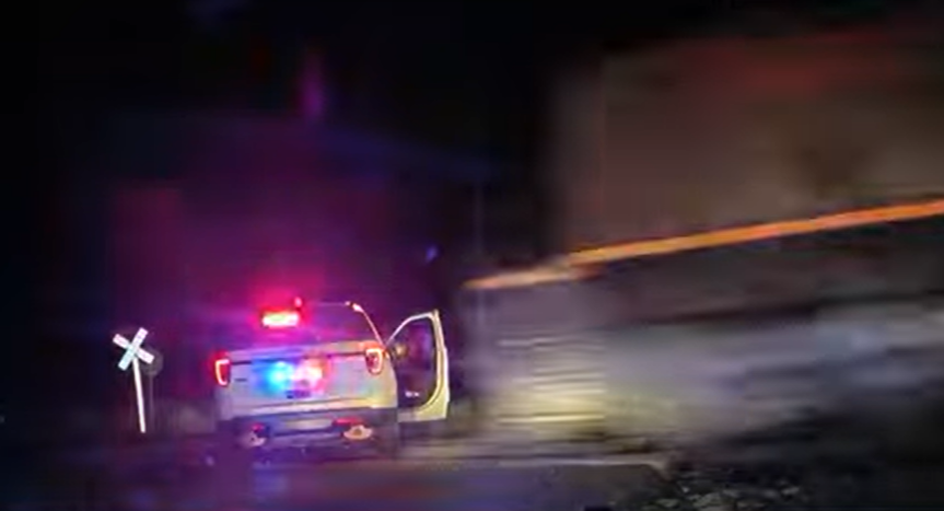 Colo officer who put woman in cruiser hit by train didnt know it was on the tracks defense says