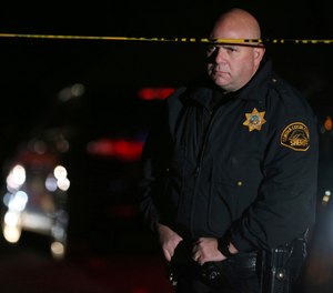 Four people were killed and four others wounded in a Halloween night party shooting at a large rental home in Orinda, Calif. A fifth person later died from her injuries. (Photo/AP)
