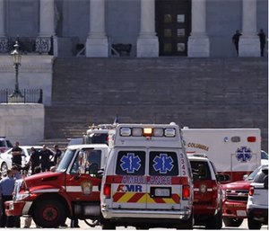 Law enforcement and rescue vehicles are seen on Capitol Hill in Washington, Monday after reports of gunfire at the Capitol Visitor Center complex. (AP Photo/Alex Brandon)