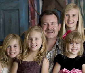 Captain Chris Fitzmaurice leaves behind his wife and four daughters.
