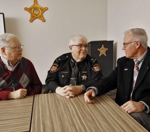 Three Franklin County chaplains, Rev. David Murdoch (left) Rev. Leo Connolly and Rev. Tim Womack discuss the role of chaplains in law enforcement. Connolly is leading the new seven-person team.