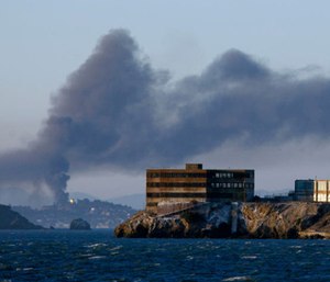 In 2013, the state fined Chevron nearly $1 million after a fire at the company's Richmond refinery sent a cloud of gas and black smoke over residential areas. (Photo/AP)