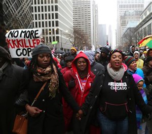 People gather during a demonstration billed as a