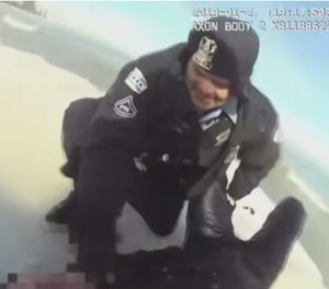 Chicago officers rescuing a man who jumped in the icy Lake Michigan to save his dog