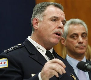 Oct. 15, 2013 file photo Chicago Police Superintendent Garry McCarthy, left, speaks at a news conference in Chicago. (AP Image)