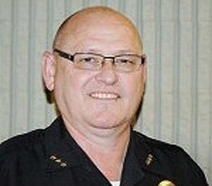 In this undated file photo released by the Peachtree City Police Department, Chief William McCollom poses for a photograph.
