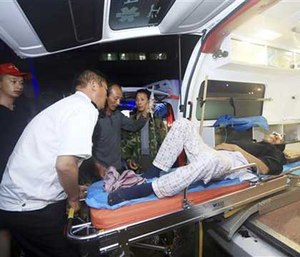 An injured man is taken care of at a hospital in Yancheng city in eastern China's Jiangsu Province. (AP Image)