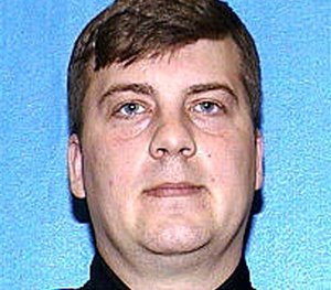 This file photo provided by the Milwaukee Police Department shows Christopher Manney who was fired from the Milwaukee Police Department in connection with the shooting and killing of Dontre Hamilton, a mentally ill man in a downtown park in April. (AP Image)