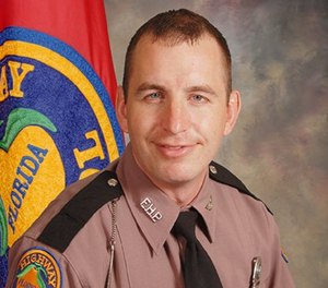 Florida Highway Patrol Trooper Joseph Bullock was killed in a shooting on Wednesday night. Riviera Beach Firefighter-Paramedic DaWayne Johnson said he was returning home from work when he stopped and tried to assist the fallen trooper. (Photo/Florida Department of Highway Safety and Motor Vehicles)