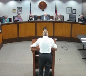 Davidson County Emergency Services Director Larry James speaks in front of the County Board of Commissioners to discuss the applications of two non-emergency ambulance franchises. The board unanimously accepted the applications. (Photo/Davidson County Board of Commissioners Youtube)