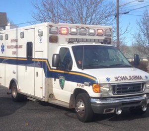 Three Riverhead Volunteer Ambulance Corps members were among four people injured when an ambulance collided with a car on Wednesday.