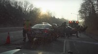 Video released of car crashing into Conn. state trooper, firefighter while on rollover scene